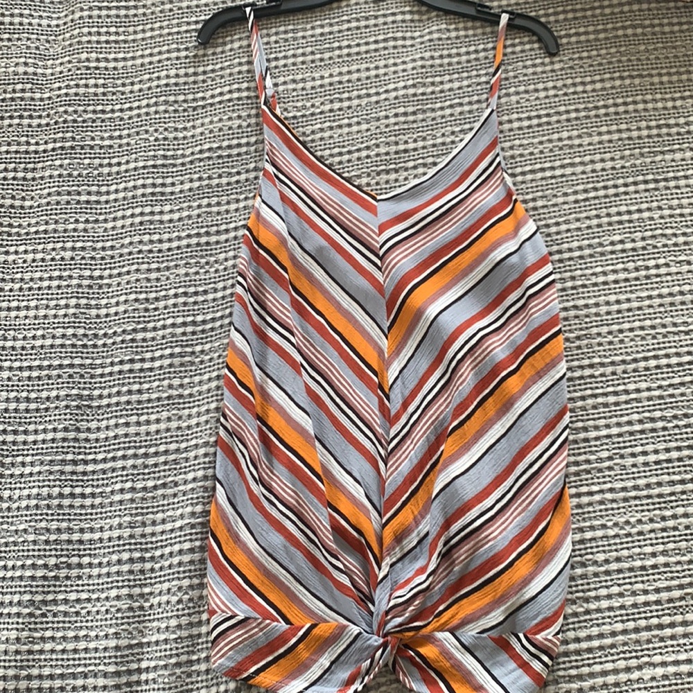 Striped tank top with a tie in the middle at the bottom